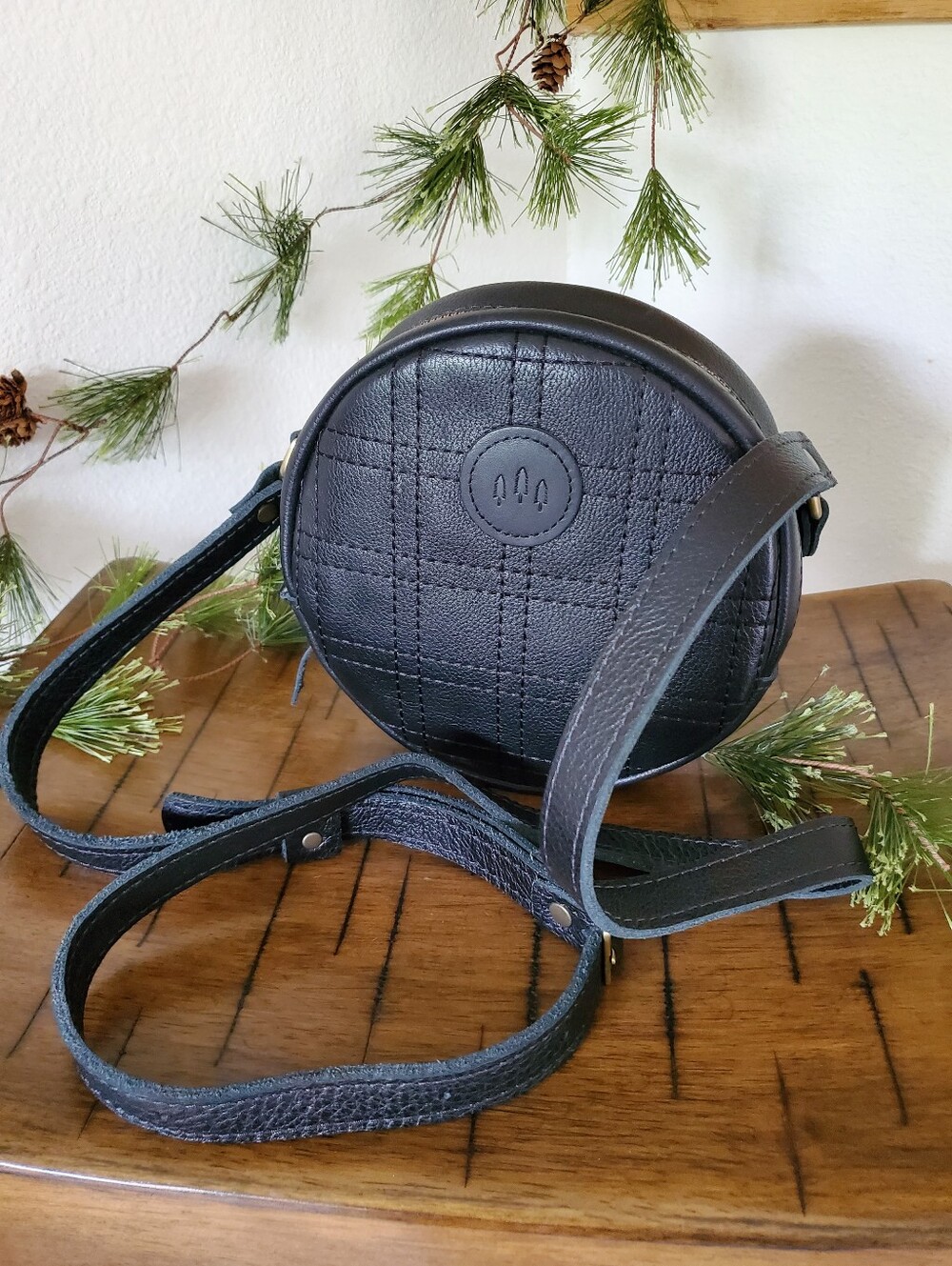 Portland Leather Limited Edition Gridlock Circle Crossbody Death Star Black
